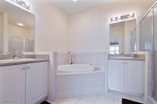 bathroom with vanity, tile patterned floors, and separate shower and tub