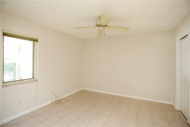 spare room featuring ceiling fan