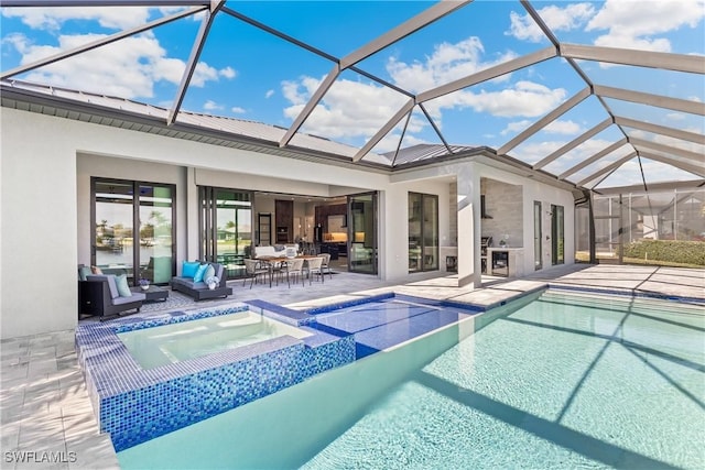 view of swimming pool with an in ground hot tub, an outdoor hangout area, glass enclosure, and a patio