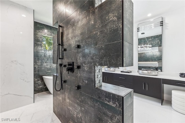 bathroom with vanity, shower with separate bathtub, and tile walls