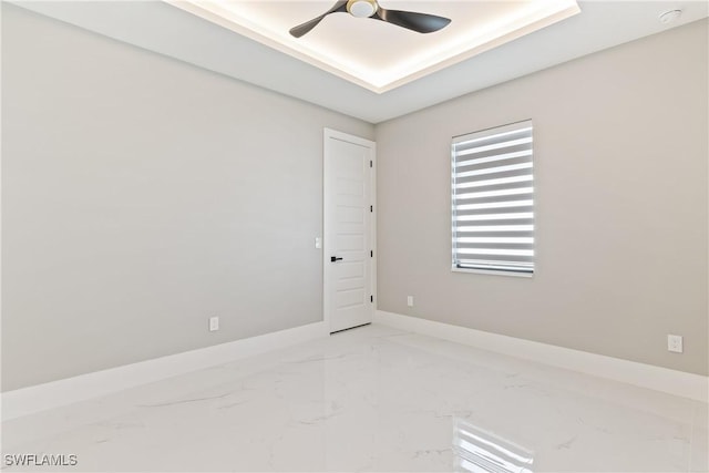 spare room with ceiling fan