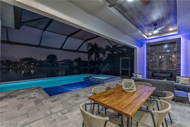 view of pool featuring ceiling fan