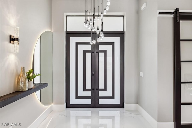 foyer entrance featuring a barn door