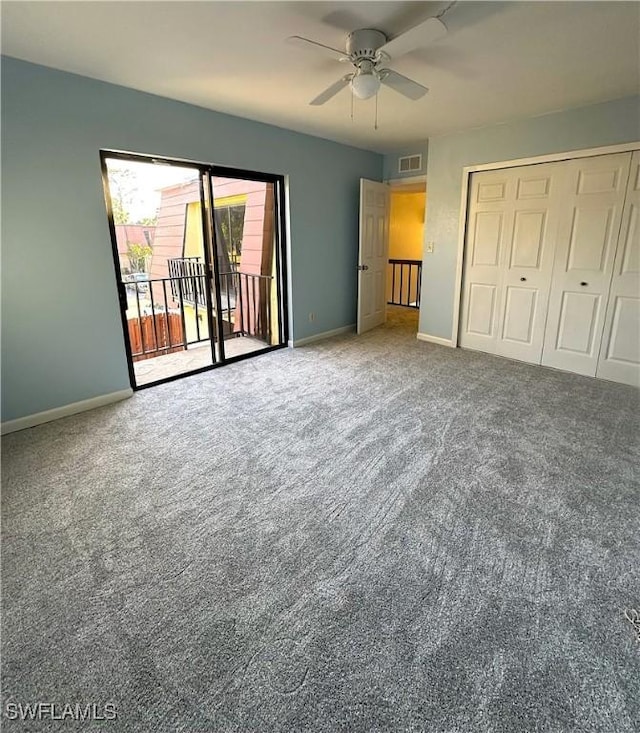 unfurnished bedroom with carpet floors, access to outside, ceiling fan, and a closet