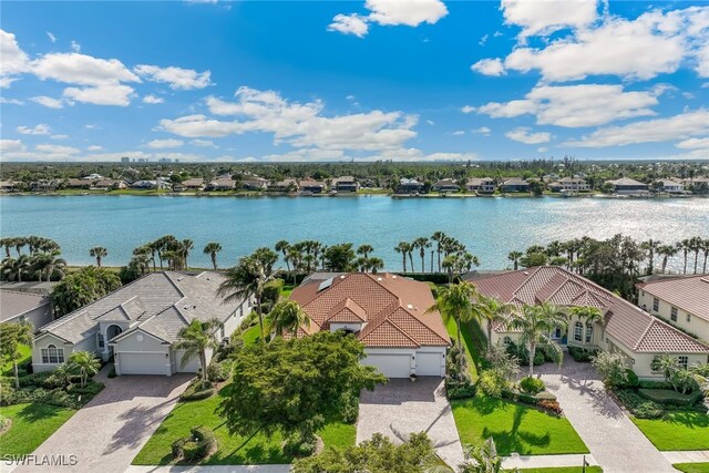 5683 Whispering Willow Way, Fort Myers, FL 33908 - aerial perspective of suburban area with a nearby body of water