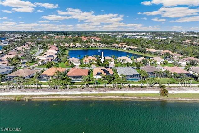 5683 Whispering Willow Way, Fort Myers, FL 33908 - aerial perspective of suburban area with a large body of water