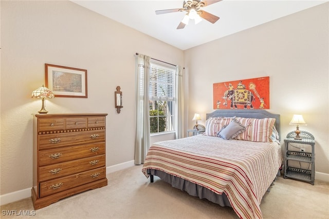 5683 Whispering Willow Way, Fort Myers, FL 33908 - bedroom with light carpet and a ceiling fan