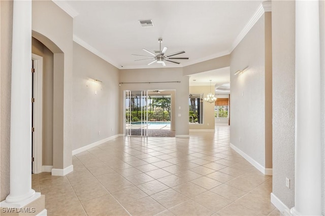 5683 Whispering Willow Way, Fort Myers, FL 33908 - empty room with ceiling fan, ornamental molding, light tile patterned flooring, and arched walkways