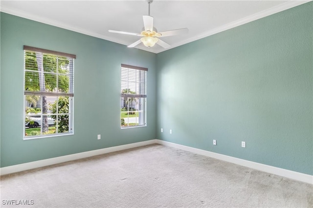 5683 Whispering Willow Way, Fort Myers, FL 33908 - spare room featuring ornamental molding, carpet floors, and a ceiling fan