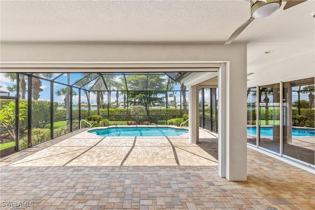 5683 Whispering Willow Way, Fort Myers, FL 33908 - swimming pool with a patio area and a lanai