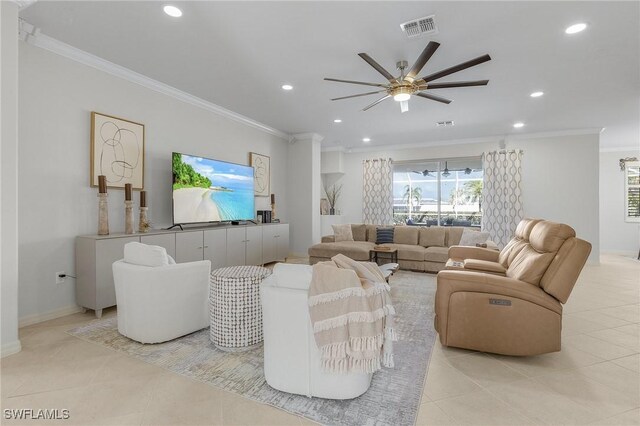 tiled living room featuring ornamental molding and ceiling fan