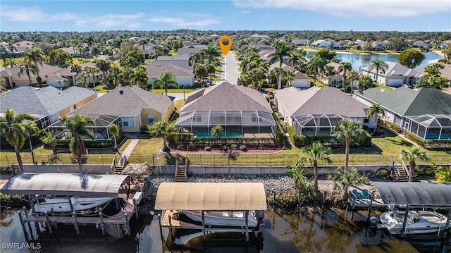 drone / aerial view featuring a water view