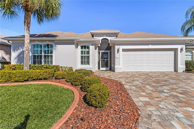 view of front of house with a garage