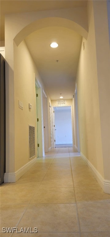 hallway with light tile patterned flooring