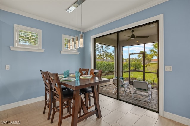 dining area with ornamental molding, ceiling fan, and light hardwood / wood-style floors