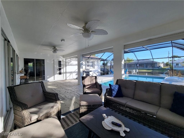 224 SW 47th St, Cape Coral, FL 33914 - view of patio / terrace with an outdoor hangout area, a ceiling fan, an outdoor pool, and glass enclosure