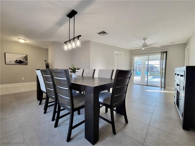 dining room featuring ceiling fan