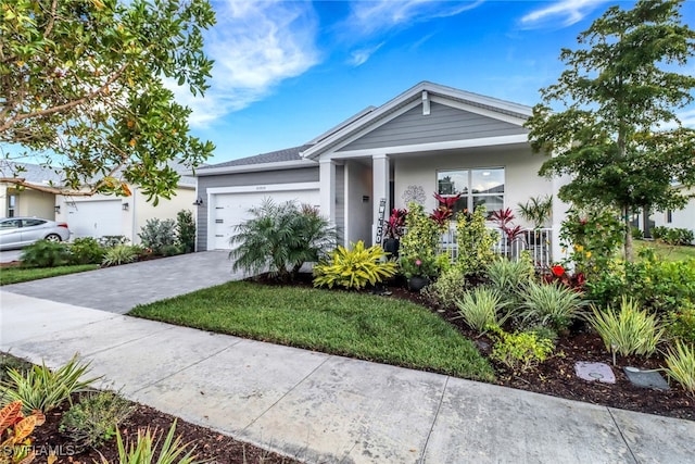 view of front of property featuring a garage