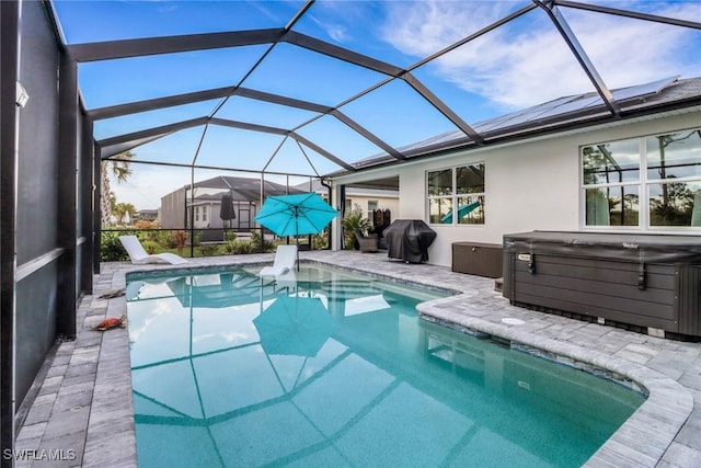 view of pool featuring a hot tub, a lanai, area for grilling, and a patio area