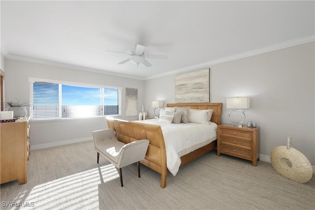 bedroom with crown molding, ceiling fan, and light carpet