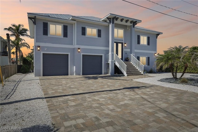 view of front of home with a garage