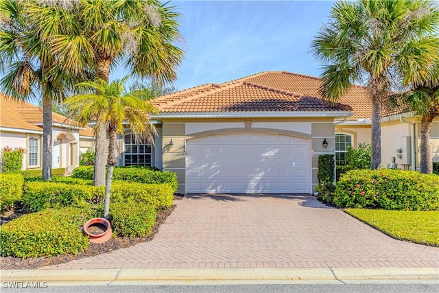 view of front of home featuring a garage