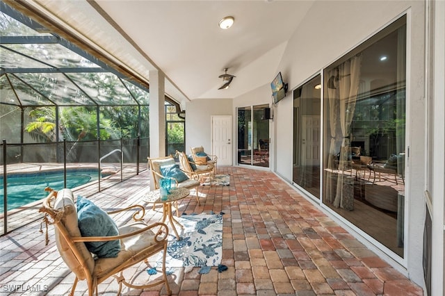 sunroom with lofted ceiling