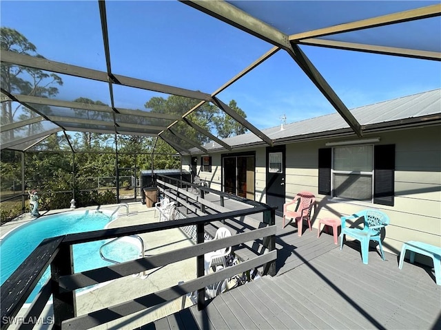 wooden deck with a lanai