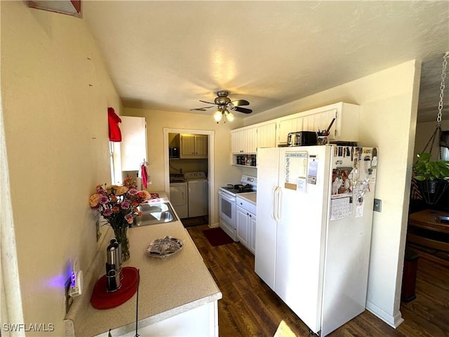 kitchen featuring white cabinetry, dark hardwood / wood-style flooring, independent washer and dryer, and white appliances