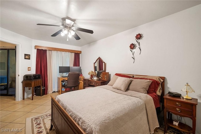 bedroom featuring light tile patterned floors and ceiling fan