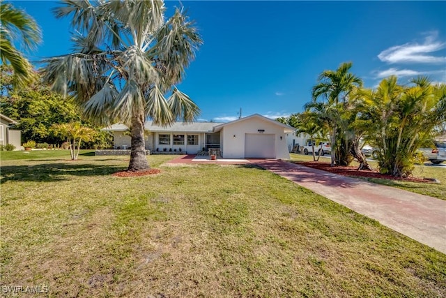 ranch-style home with a garage and a front yard