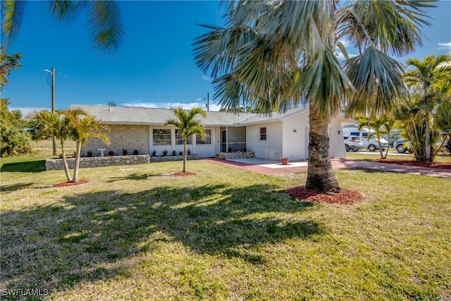 exterior space featuring a front lawn