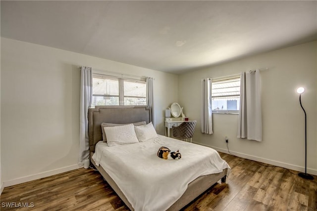 bedroom featuring hardwood / wood-style floors