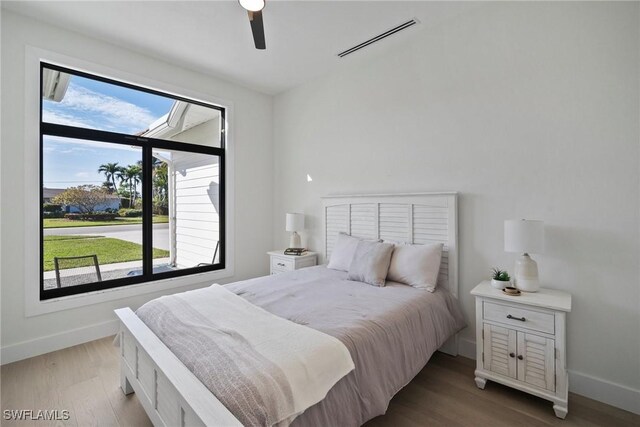 bedroom featuring ceiling fan and light wood-type flooring