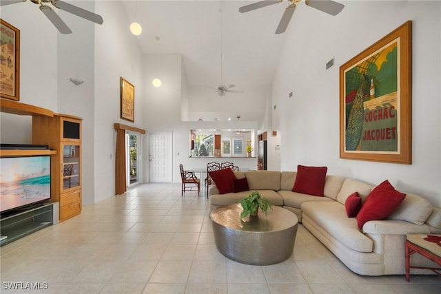 living room with light tile patterned floors and ceiling fan