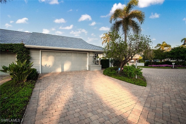 ranch-style home with a garage