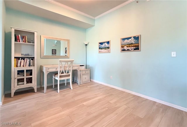 office featuring crown molding and light hardwood / wood-style flooring