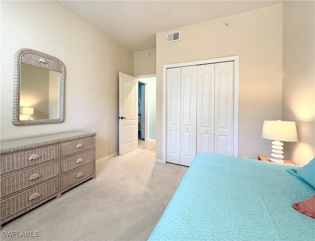 carpeted bedroom with a closet