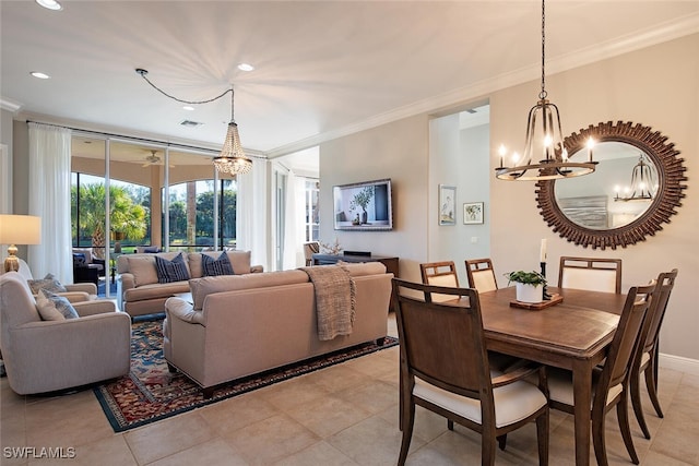 dining space featuring crown molding, an inviting chandelier, and light tile patterned floors