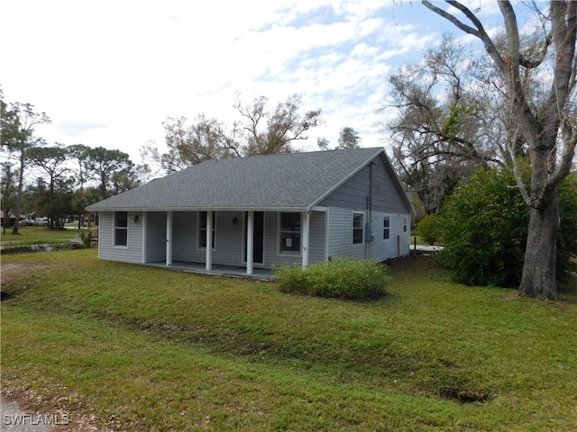 view of front of home with a front lawn