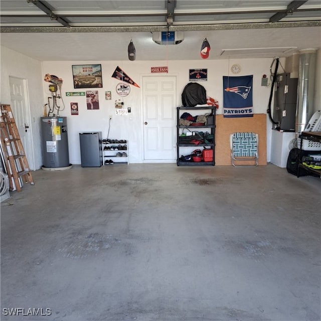garage with water heater and a garage door opener