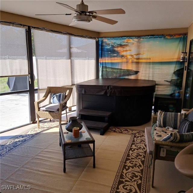 sunroom / solarium featuring a hot tub