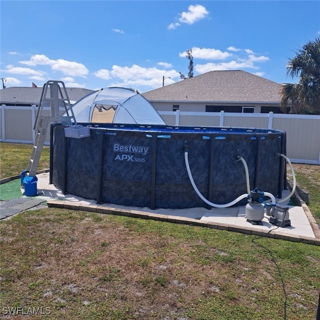 view of pool with fence and a fenced in pool