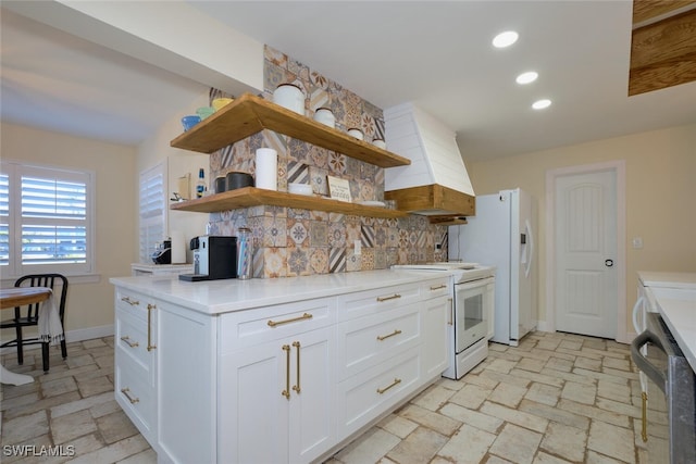 kitchen featuring premium range hood, tasteful backsplash, dishwashing machine, white cabinets, and white electric range oven