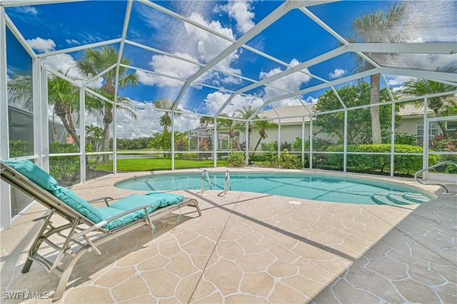 view of pool featuring a lanai and a patio area