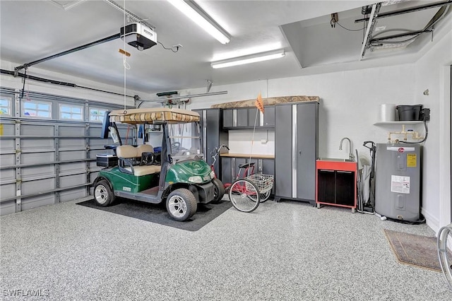 garage featuring a garage door opener and water heater