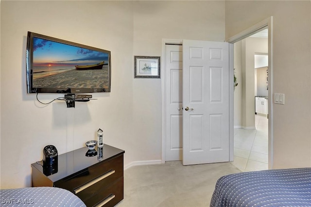 bedroom with light colored carpet