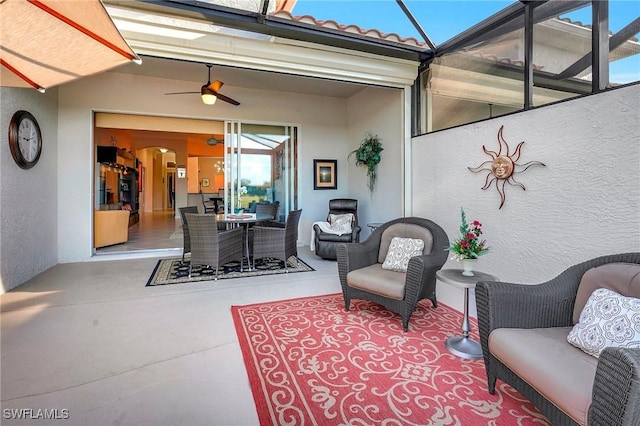 view of patio / terrace featuring ceiling fan