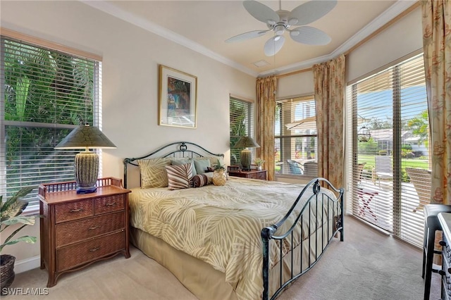 bedroom featuring crown molding, ceiling fan, light carpet, and access to outside