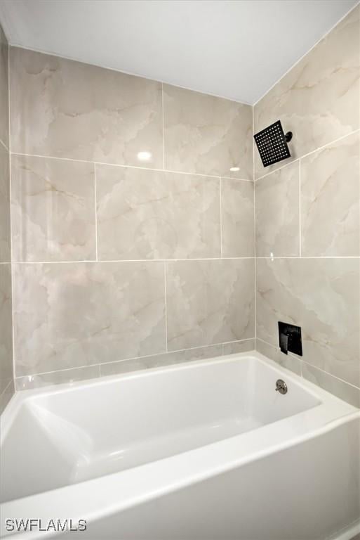 bathroom featuring tile walls